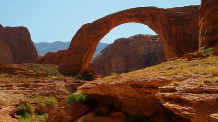 Photo of rainbow Bridge in Rainbow Bridge National Monument near Navajo Mountain and accessed by way of Lake Powell or by a long hike.